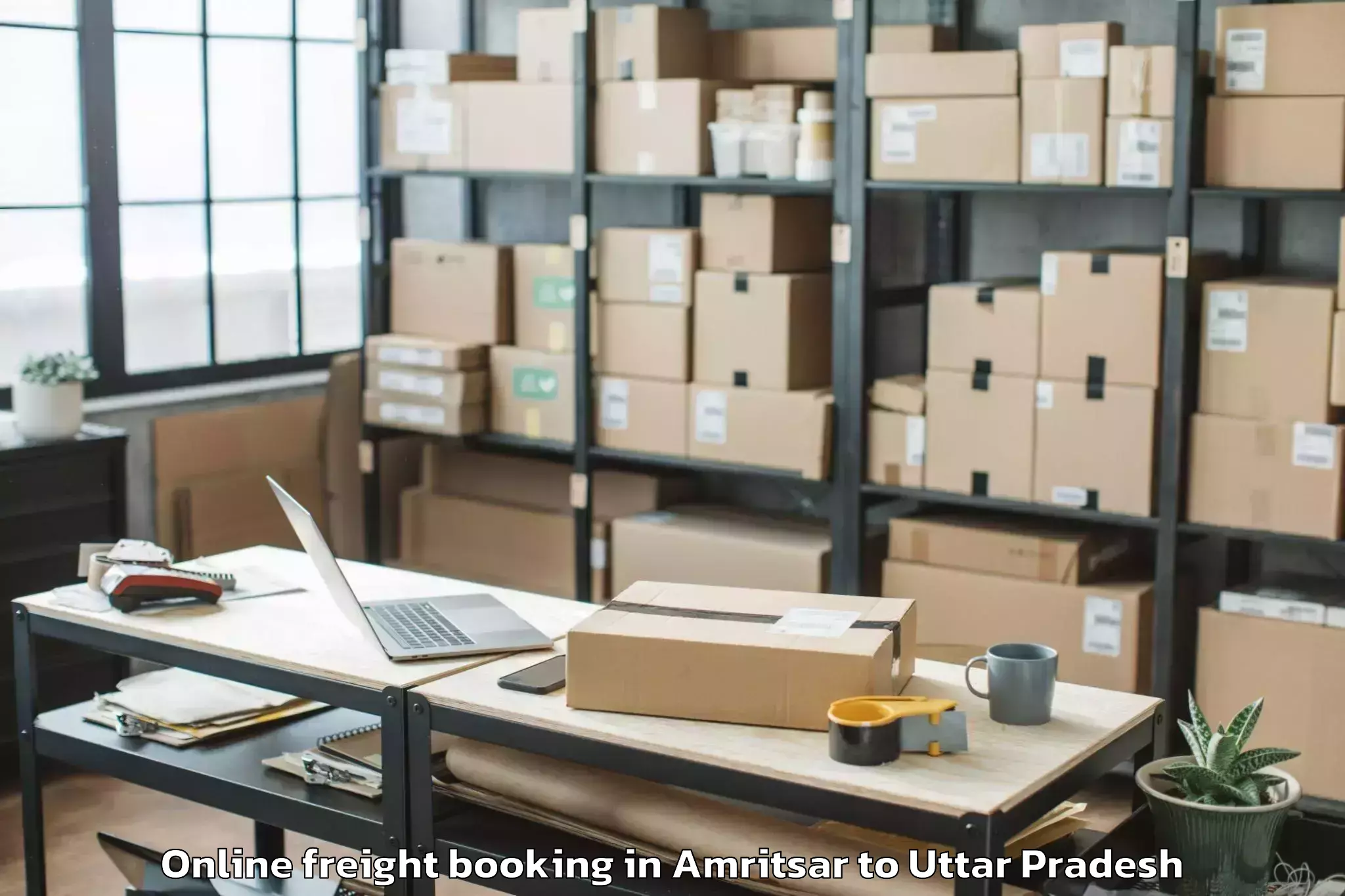 Leading Amritsar to Gahmar Online Freight Booking Provider